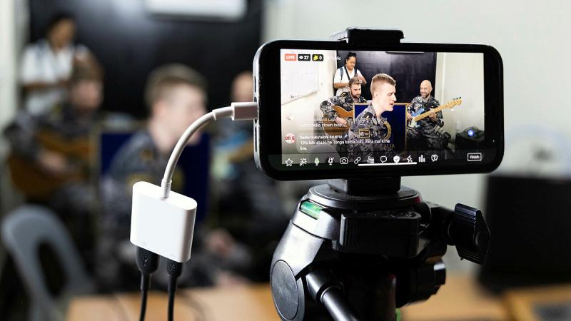 Members of the Royal Australian Navy Acoustic Trio perform for the Radio Nuku’alofa 88.6FM breakfast show during an official visit in Nuku’alofa, Tonga as part of a regional presence deployment. 