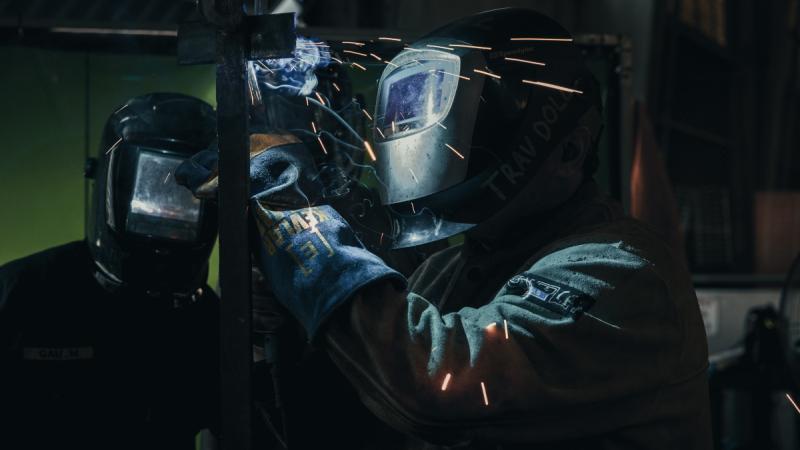 Australian Army soldier Sergeant Travis Doll from 3rd Combat Service Support Battalion demonstrates a welding practice at Murray Barracks, Port Moresby, Papua New Guinea.