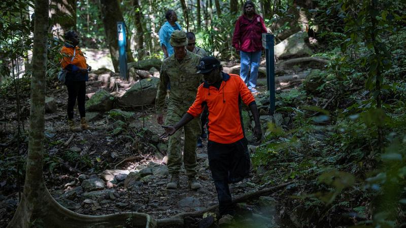  Lieutenant Colonel Robert Miller learns from local Djabugay Indigenous group members about their native lands around Barron Gorge hydroelectric power plant in Cairns during a cultural knowledge exchange ahead of Exercise Austral Shield. 