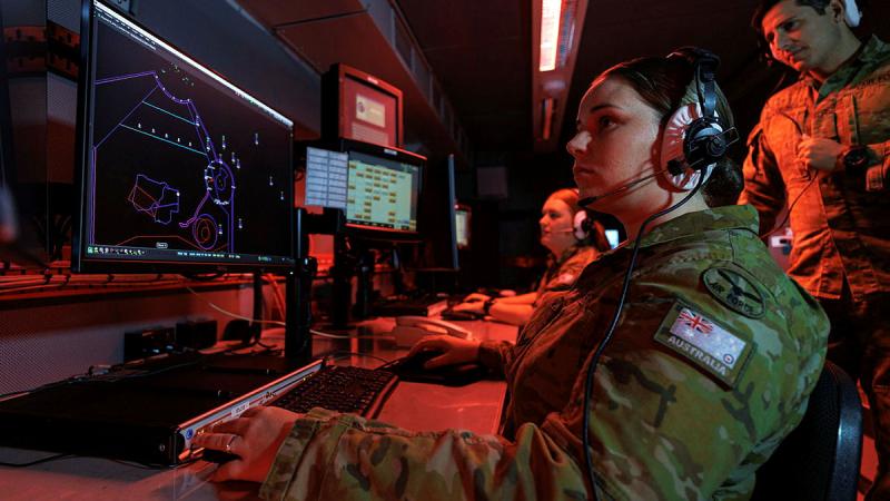 Air Surveillance Operator Corporal Mikayla Dows from 114 Mobile Control and Reporting Unit monitor the airspace inside the Mobile Control Reporting Centre during Exercise Pitch Black 24. 