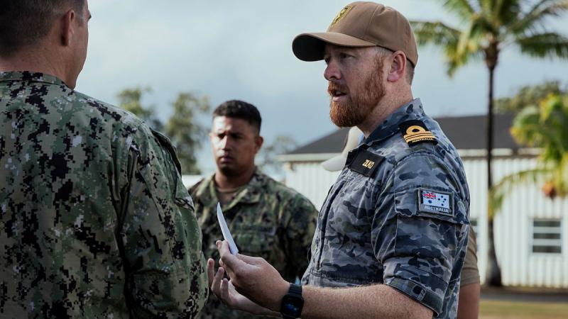 Royal Australian Navy Mine Warfare Clearance Diving Officer, Lieutenant Commander Adam Zilko, during a brief for mine counter measures as a part of Exercise Rim of the Pacific (RIMPAC) 24 in Hawaii.