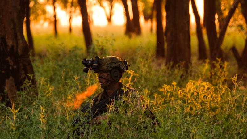 Personnel from the 1st Brigade and the Armed Forces of the Philippines clear an objective as Battle Group Tiger at Bradshaw training area, NT, during Exercise Predators Run 2024.