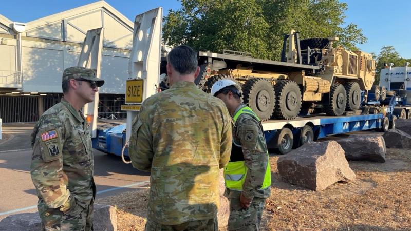 Australian and U.S. Army personnel take receipt of a U.S. Army M1075 Palletized Load System (PLS) vehicle in Darwin for Exercise OPEROSE following its rapid re-activation at Bandiana, Victoria.