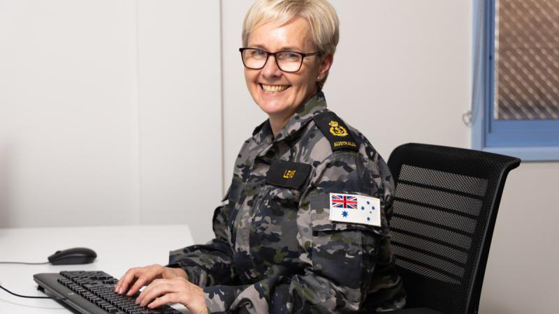 Chief Petty Officer Karen Lewis performs her role as a Navy Business Analyst.