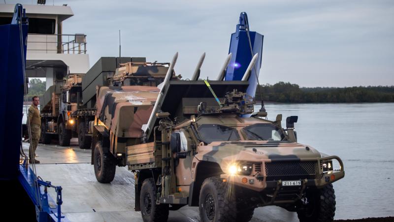 An Australian Army Hawkei Protected Mobility Vehicle – Light transporting mock-up NASAMS during Exercise Predator's Run on the Tiwi Islands, NT.