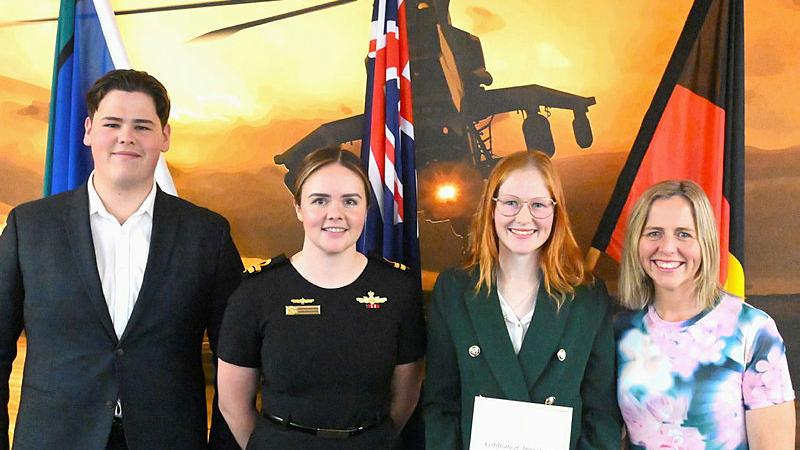  Three members of the Pearn family and a Royal Australian Navy officer at the ADF Careers Centre, Wollongong. From left, Sub Lieutenant Rhys Pearn, Lieutenant Jordie McLeod, Breanna Pearn, and Leading Seaman Vicki Pearn.