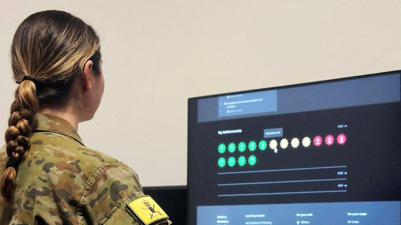 An Australian Army soldier logs onto The Cove 4.0 professional military education platform. 