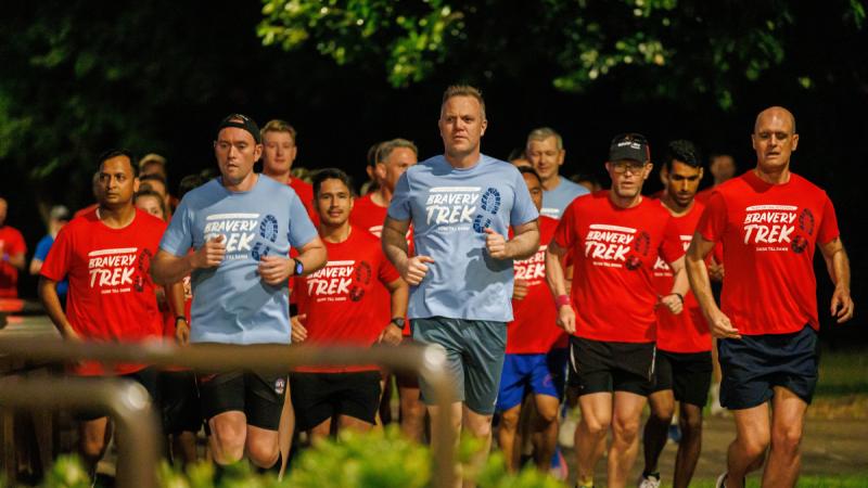 From left, Bravery Trust Ambassador Squadron Leader Adon Lumley, Chief of Air Force Air Marshal Stephen Chappell, Chief Executive Officer Bravery Trust Garth Callender and many other participants participate in the Exercise Pitch Black Friendship Run in Darwin.