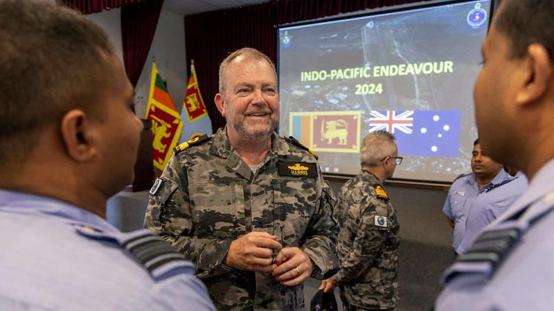 Commander Indo-Pacific Endeavour Commodore Michael Harris talks to Sri Lanka Navy officers after the Indo-Pacific Endeavour 2024 military law and maritime surveillance workshop.