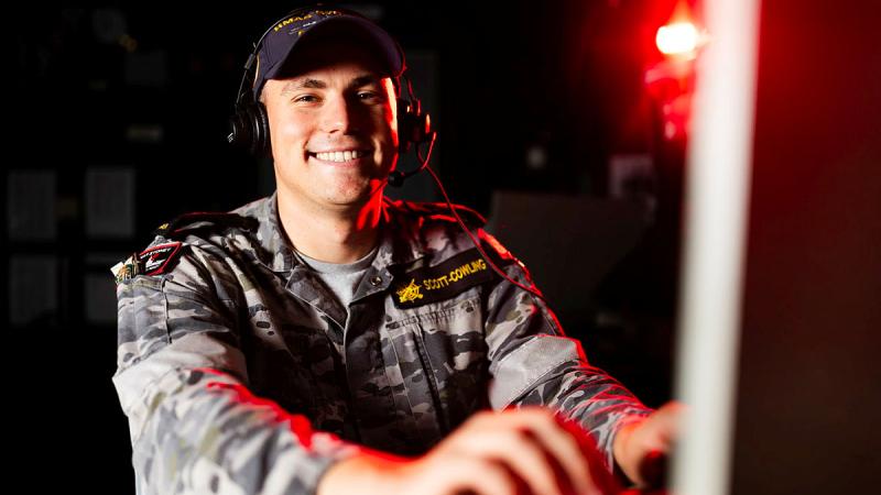 Leading Seaman Combat Systems Operator Django Scott-Cowling takes part in a publications exercise on board HMAS Sydney during a regional presence deployment. 
