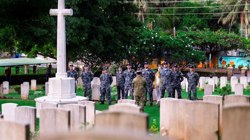Australian military personnel gather for a dawn service at the Trincomalee Commonwealth War Cemetery in Sri Lanka. 