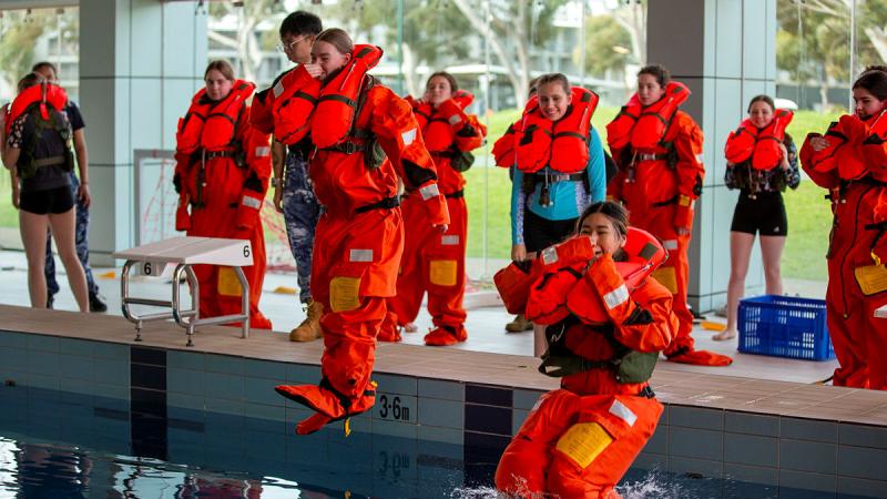 Participants of the Air Force Aviation Program for Women take part in a pool activity, under the instruction of 11 Squadron Aeronautical Life Support personnel, at RAAF Base Edinburgh in Adelaide, SA. 