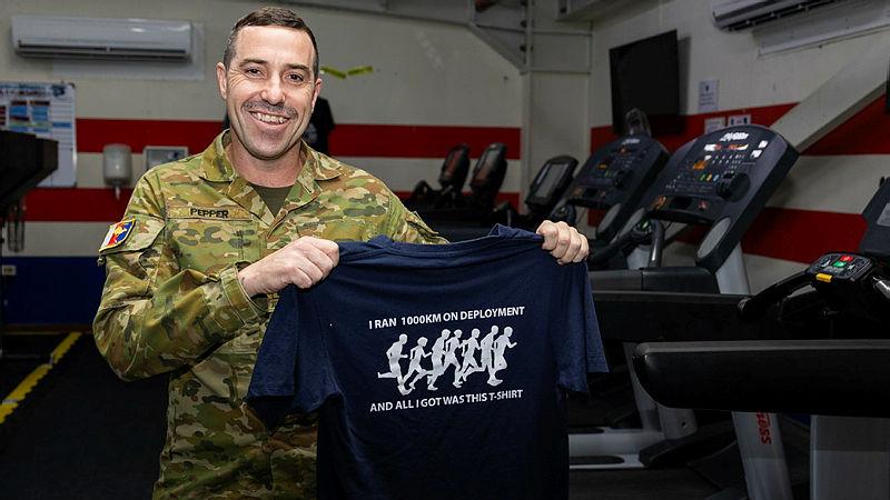 Warrant Officer Class 2 Rick Pepper with his '1000km Club' t-shirt at the Camp Baird Gym in Headquarters Middle East. 
