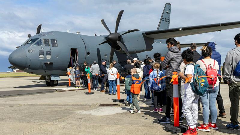 Members of the public line up to receive a tour onboard the C-27J Spartan during the RAAF Base Point Cook Open Day, Victoria. 