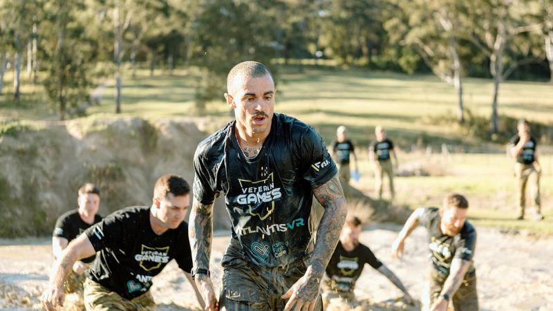 Royal Australian Air Force Leading Aircraftman Nicholas Greenslade leads the 2 Security Force Squadron team out of an obstacle while competing in the 2024 Veteran Games at the Gold Coast. 