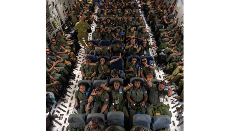 Members of the Republic of Fiji Military Forces aboard a Royal Australian Air Force C-17 Globemaster for the final leg of their journey home from the United Nations Assistance Mission for Iraq. 