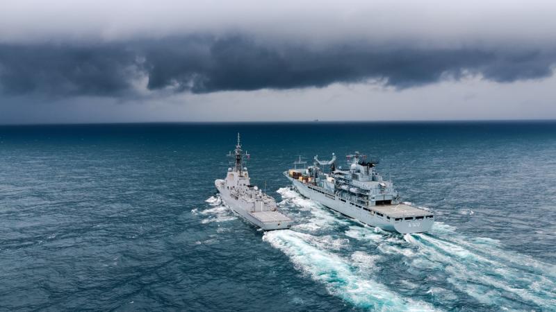 HMAS Sydney and German Navy ship FGS Frankfurt am Main conduct a replenishment at sea as the ships conduct cooperation activities in the Yellow Sea during Operation Argos.