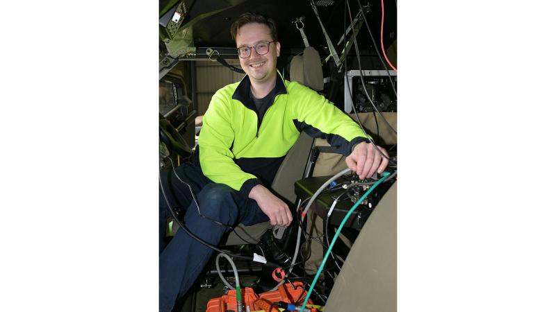 Alexander Mazur, an Engineer with Prototype and Test Services, Land Engineering Agency in a Defence vehicle at the Monegeetta Proving Ground near Melbourne.