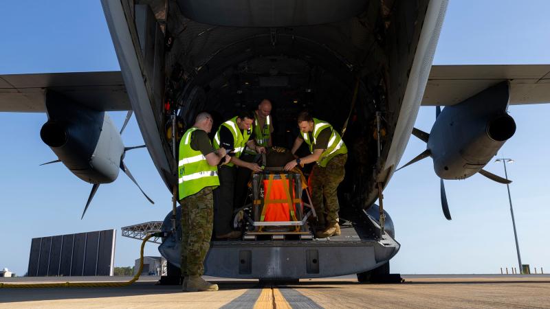 Air Force loadmasters from 35 Squadron and Army air dispatchers from 176 Air Dispatch Squadron prepare a C-27J Spartan for a maritime aerial delivery during Exercise Kakadu, RAAF Base Darwin, NT. 