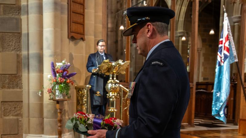 Representing the Chief of Air Force, Air Commodore James Badgery lays a wreath at St David's Cathedral in Hobart during the Battle of Britain National Commemoration service. 