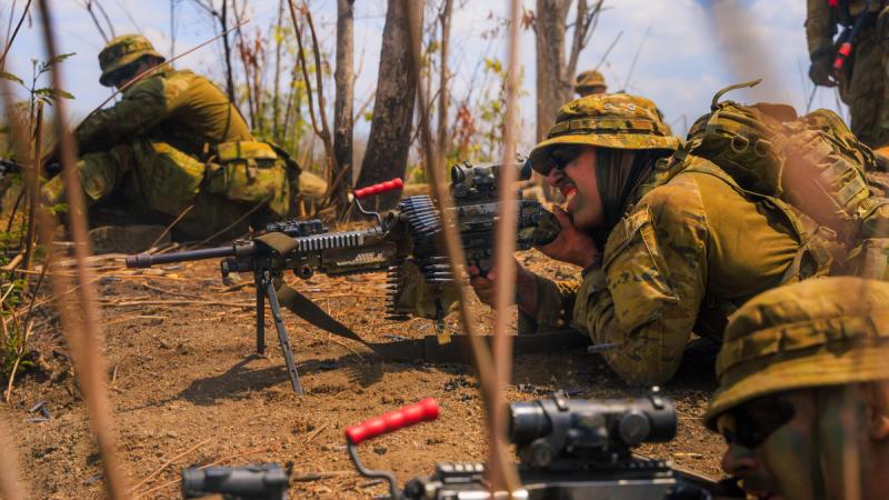 Australian Army soldiers from 5th Battalion, the Royal Australian Regiment, engage a threat after receiving fire-control orders from their section commander during a joint field training exercise conducted on Exercise Super Garuda Shield 2024 in Surabaya, Indonesia.