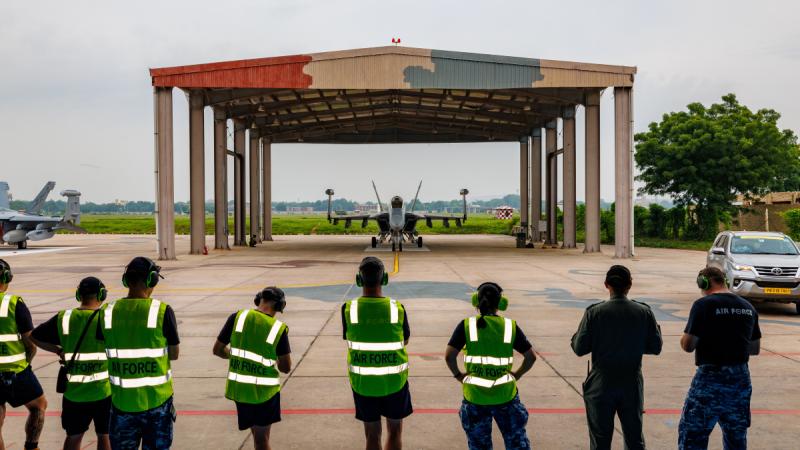 Flight Lieutenant Declan Foley prepares a No.6 Squadron EA-18G Growler for the Royal Australian Air Forces first sortie during Tarang Shakti 24, at Air Force Station Jodhpur, India.