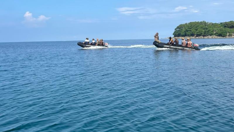 Members from the Australian, United States and Philippine navies transit to an exercise location at Naval Station Ernesto Ogbinar as part of Exercise Sama Sama in Luzon, Philippines. 