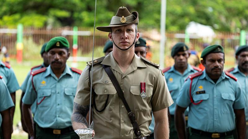 Lieutenant Anthony Basaglia and PNG Defence Force soldiers during a ceremonial parade to celebrate the 49th Independence Day in Wewak, PNG. 