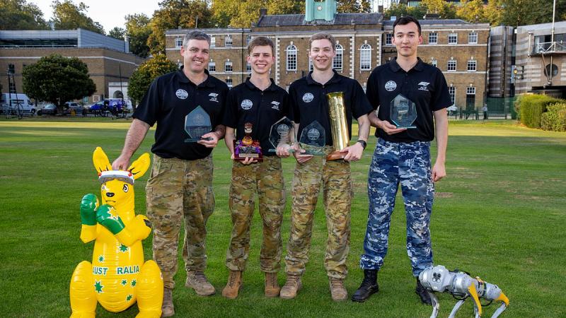 From left, Lance Corporal Daniel McCullock, Cadet Sergeant Zachary Melvaine, Private Hamish Glover and Leading Aircraftman Nelson White with their trophies for winning the Military International Drone Racing Tournament in London in September. 