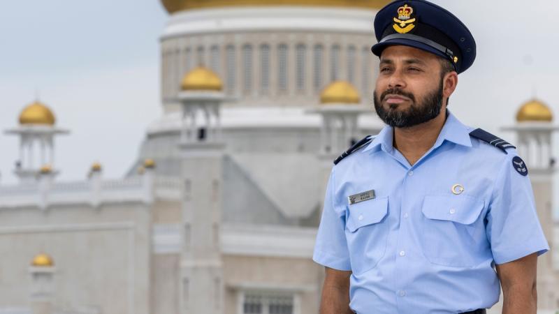 Air Force Chaplain, Flight Lieutenant Abdul Kader stands outside the Sultan Omar Saifuddin Mosque, during Indo-Pacific Endeavour 2024 – Brunei.