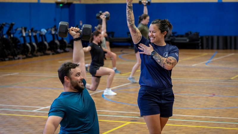 Royal Australian Navy sailor Chief Petty Officer Physical Training Instructor, Tamara Prins, instructs a class on proper lifting technique at HMAS Stirling, WA. 