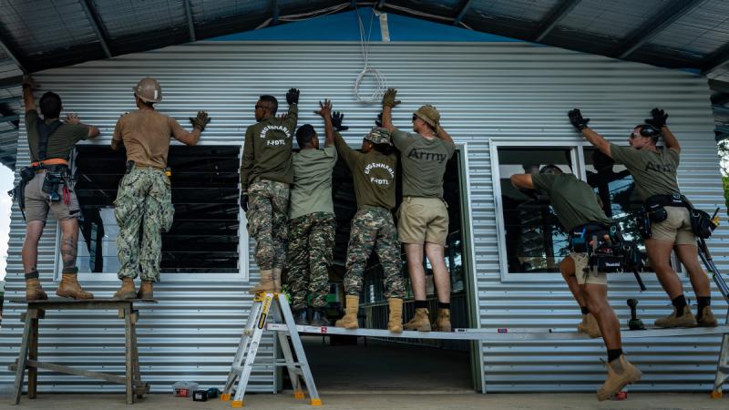 Australian Army engineers from the 1st Combat Engineer Regiment, 6th Engineer Support Regiment, Timor-Leste Defence Force, and US Navy Construction Battalion construct two new barracks buildings during Exercise Hari'i Hamutuk 2024. 