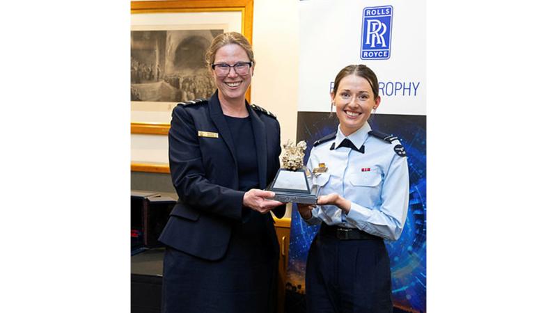 Air-Vice Marshal Wendy Blyth presents Flying Officer Alberta Redgrove The Eagle Trophy at the annual Rolls-Royce Eagle Trophy presentation dinner in Canberra, ACT. 