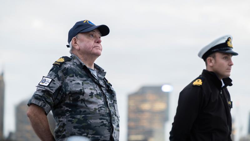 Warrant Officer Andrew Freame during his last sunset ceremony onboard HMAS Hobart at Fleet Base East, Sydney, New South Wales. 