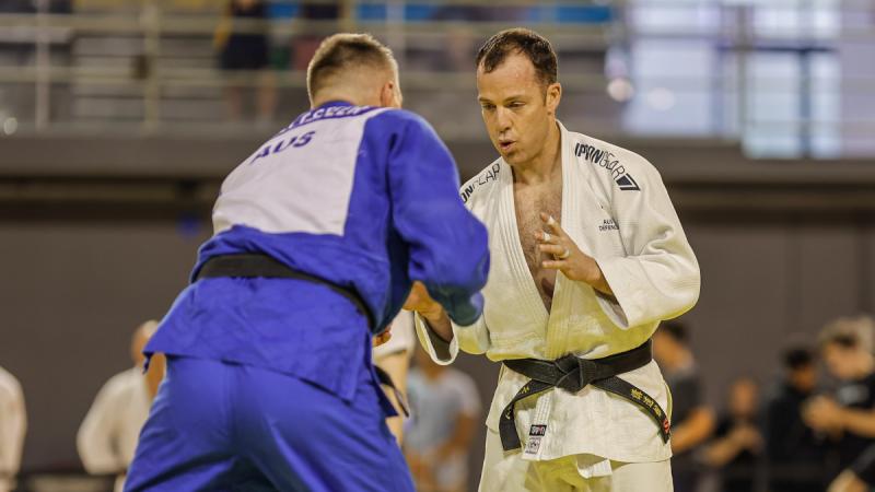 Lieutenant Colonel Morgan McCarthy (white uniform) competes in the Queensland International Open Judo tournament.