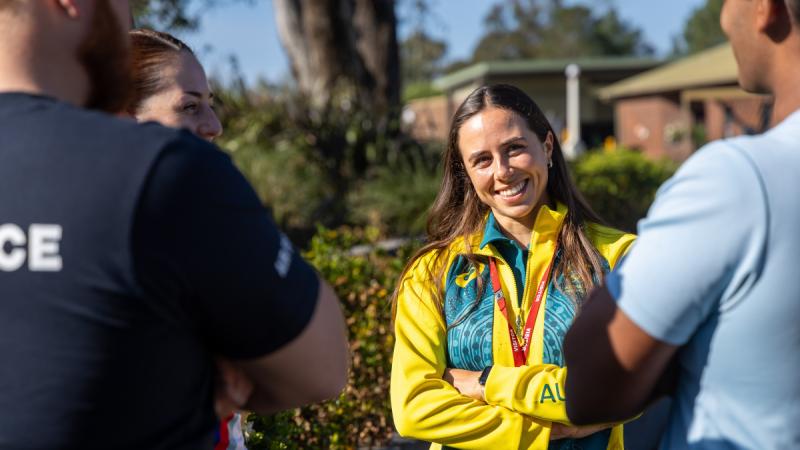 Australian Olympian Noemie Fox chats with ADF fitness leaders from RAAF Base Glenbrook during her visit as part of Mental Health Awareness Month.