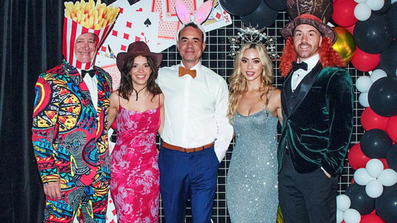 The Committee for the 2024 Northern Territory Officers' Ball dressed to the night’s Mad Hatter/Alice in Wonderland theme. 