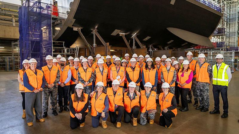 Members of the Team Hunter Integrated Project Team Working Group gather at Osborne Naval Shipyard in Adelaide.