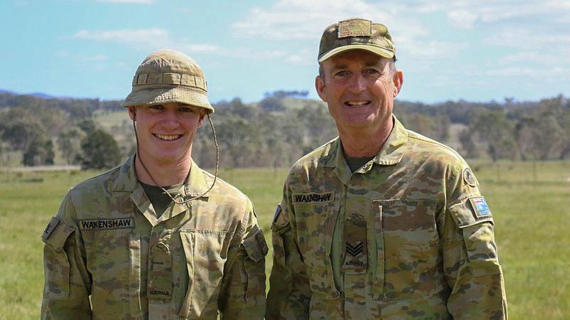 Private Riley Wakenshaw, left, and  father Sergeant Paul Wakenshaw, who worked together on logistics at a cadet exercise.