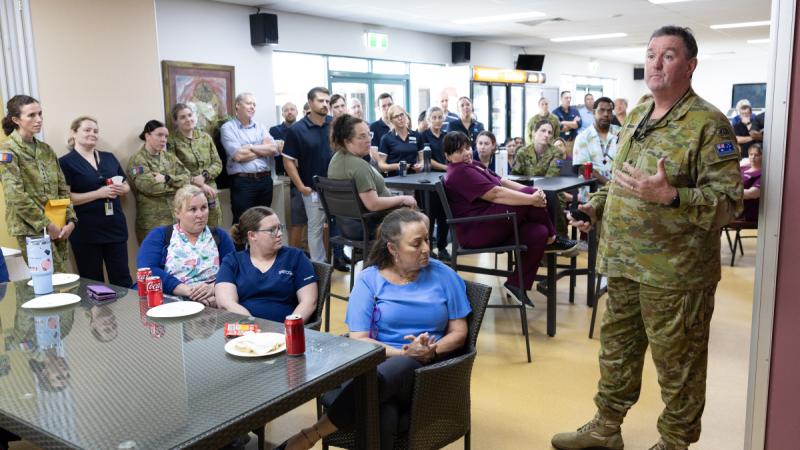 Lieutenant Colonel Stephen Jenkins, staff officer at Headquarters 1st (Australian) Division, thanks staff at the Enoggera Health Centre, Gallipoli Barracks, Brisbane, after his recovery from cancer.
