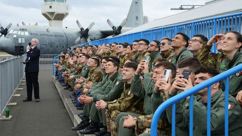 The Italian Air Force Academy cadets witness a flying display by the CAC Winjeel from 100 Squadron Heritage Fleet during their visit to RAAF Bases Williams and Point Cook. 