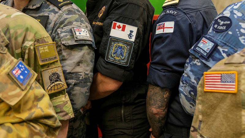 From left, cyber specialists from the Australian Army, New Zealand Army, Royal Canadian Navy, Royal Navy, the Royal Australian Air Force, and the US Army took part in Exercise Cyber Sentinels. 