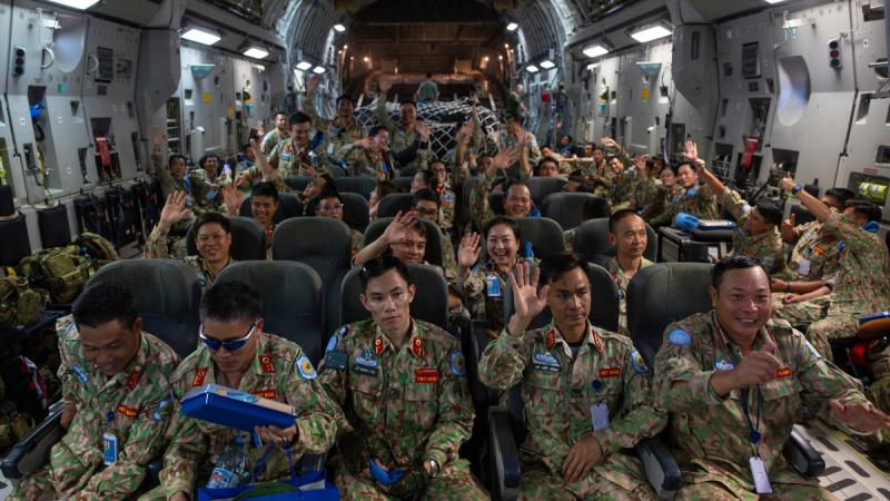 People’s Army of Vietnam UN peacekeepers prepare to take off from Juba International Airport, South Sudan, after boarding a RAAF 36 Squadron C-17A Globemaster during a strategic airlift.