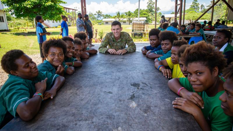 Australian Army Jonathan Church Good Soldiering Award ambassador Private Caleb Walker speaks with secondary school students from 2/22nd Battalion St. Paul's Tol High School, named to honour the service and sacrifice of 2/22nd Australian Infantry Battalion, in East New Britain, PNG.