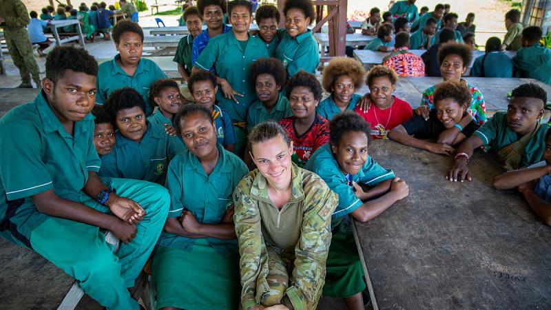 Sergeant L with secondary school students from 2/22nd Battalion St. Paul's Tol High School named to honour the service and sacrifice of 2/22nd Australian Infantry Battalion in New East Britain, PNG. 
