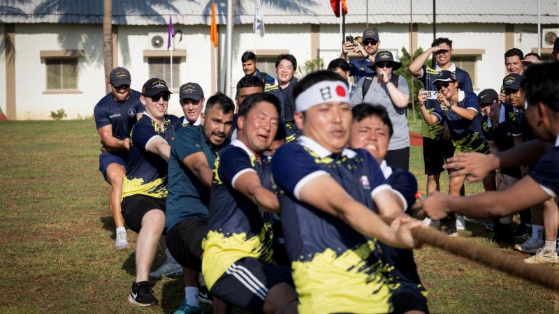 Sailors and officers from the Royal Australian Navy, US Navy, Indian Navy and Japan Maritime Self-Defense Force verse each other in tug of war during an Exercise Malabar sporting event in Visakhapatnam, India.