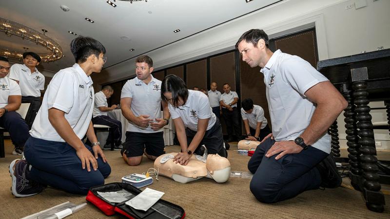 RAAF Warrant Officer Michael Allison (centre left) guides Royal Thai Armed Forces personnel through a sports injury management first aid workshop as part of Indo-Pacific Endeavour 2024 in Bangkok, Thailand. 