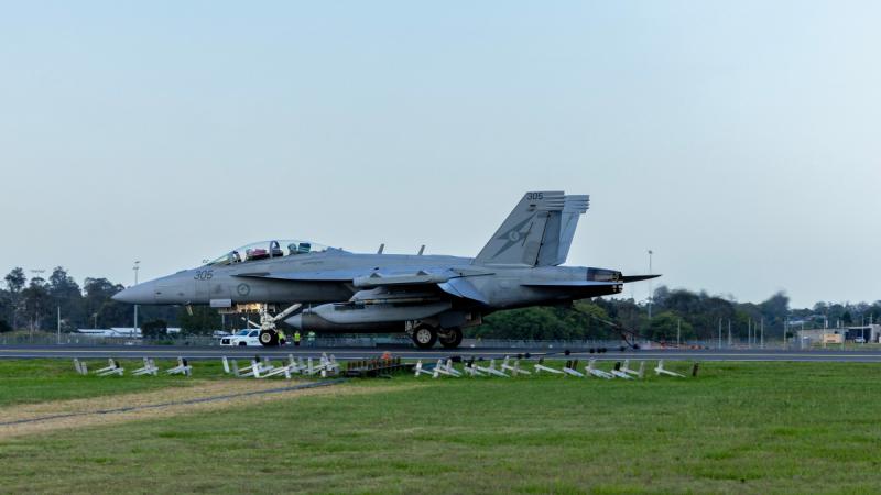 A RAAF EA-18G Growler lands using a Mobile Aircraft Arrestor System to demonstrate its capabilities at RAAF Base Amberley, Queensland.
