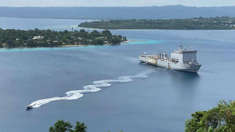 HMAS Choules arrives at Port Vila, Vanuatu, for a port visit. 