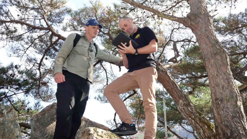 Adam Bourke, left, and Major Dan Nailer fix their position during a reconnaissance of the Kapyong battlefield in the Republic of Korea.